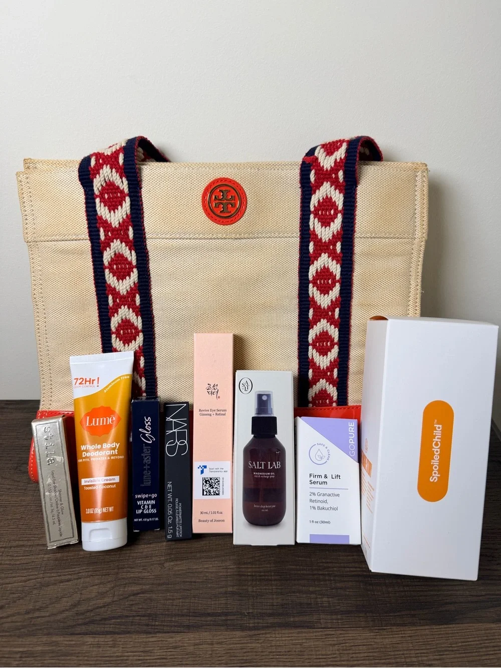 Tory Burch canvas bag with Spoiledchild Collagen, Beauty of Joseon, NARS, Stila
